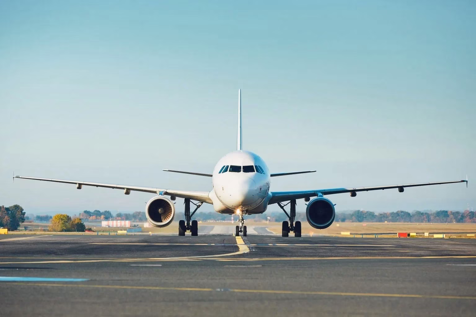 Airplane on runway, representing the Ashville Regional Airport in NC