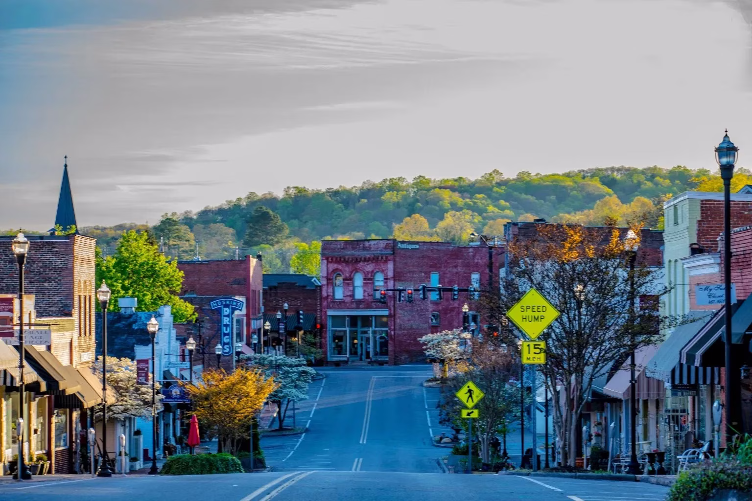 Downtown Antique District in Clinton, TN with mountains in the background.