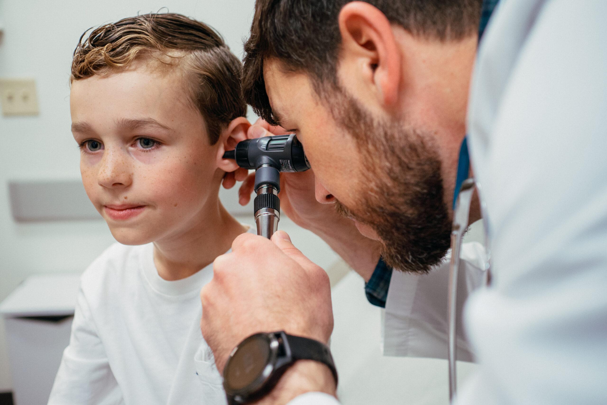 AFC provider examining child patient