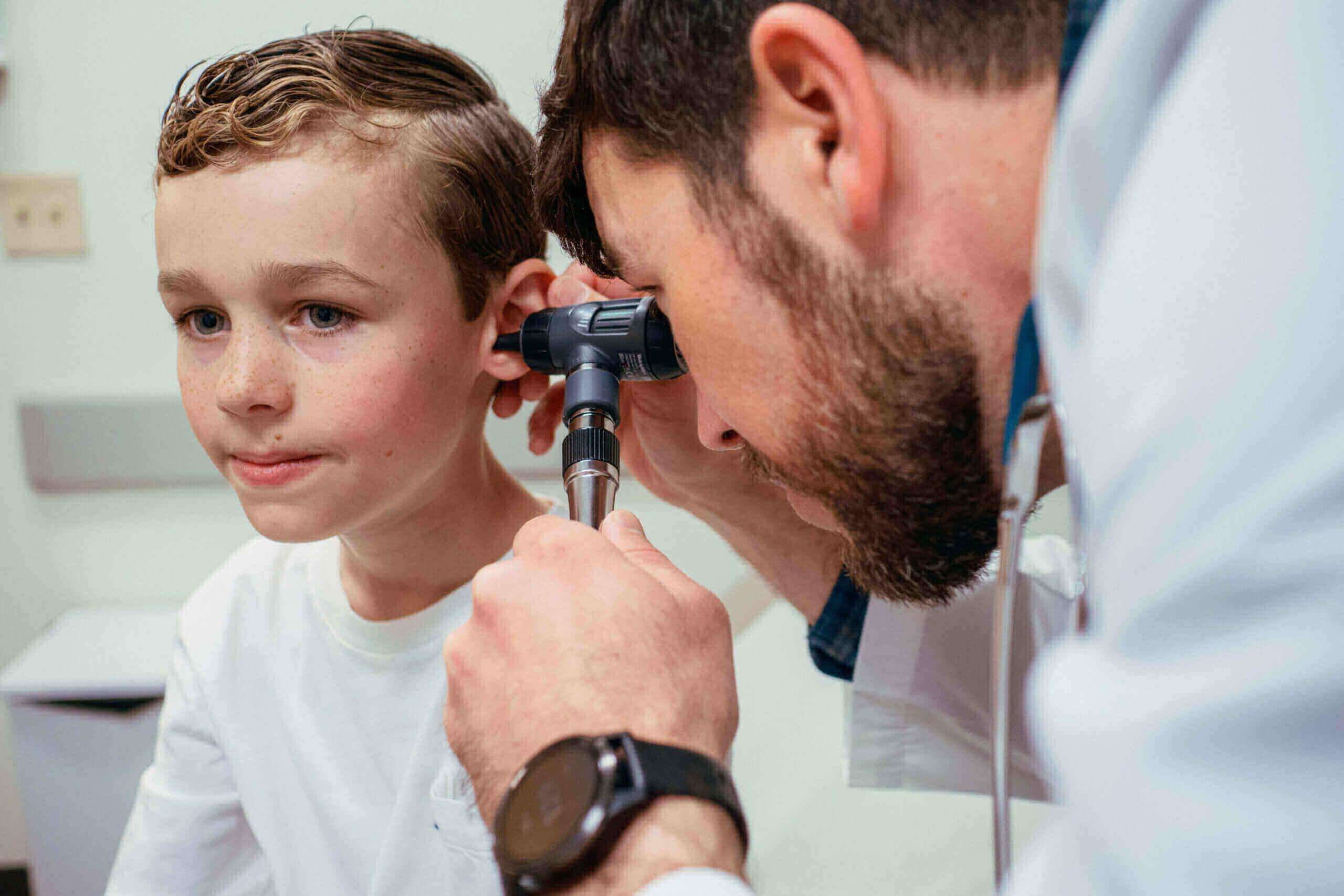 Child having ear examined for infection