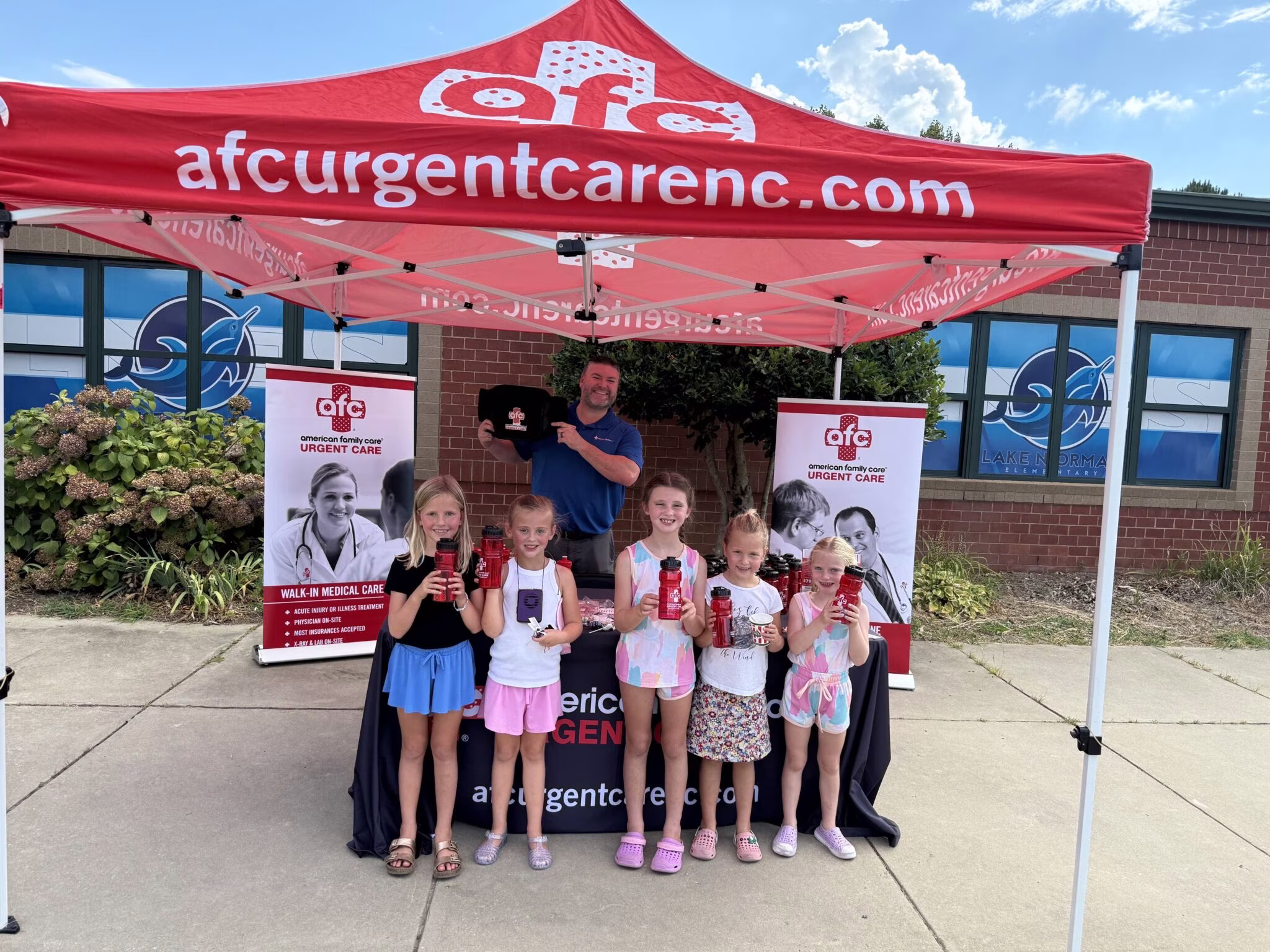 AFC Urgent Care Lenoir team at a community event in Caldwell County NC