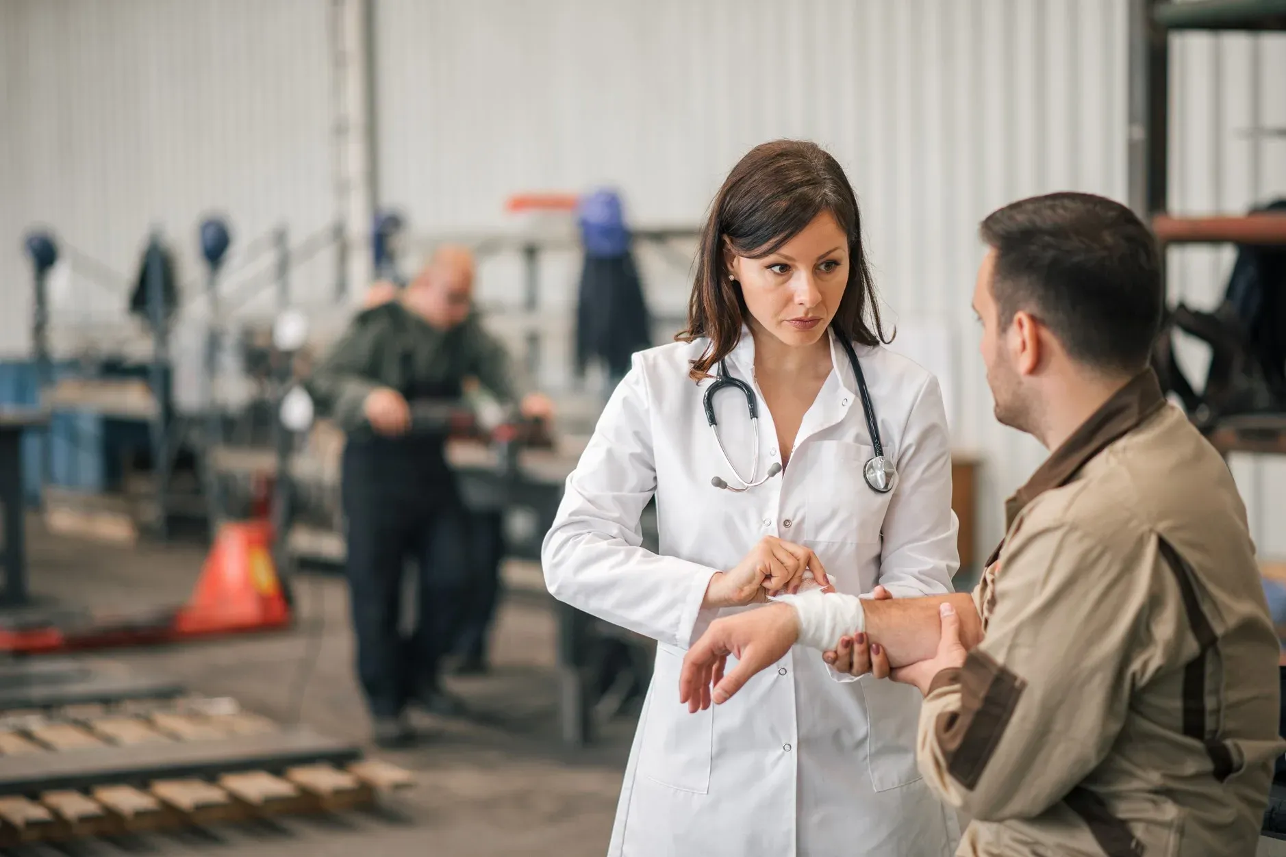 Medical provider examining employee for workers’ comp services