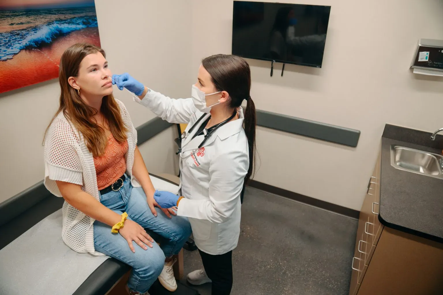 Female Patient Getting Tested For RSV at AFC Female Patient Getting Tested For RSV at AFC